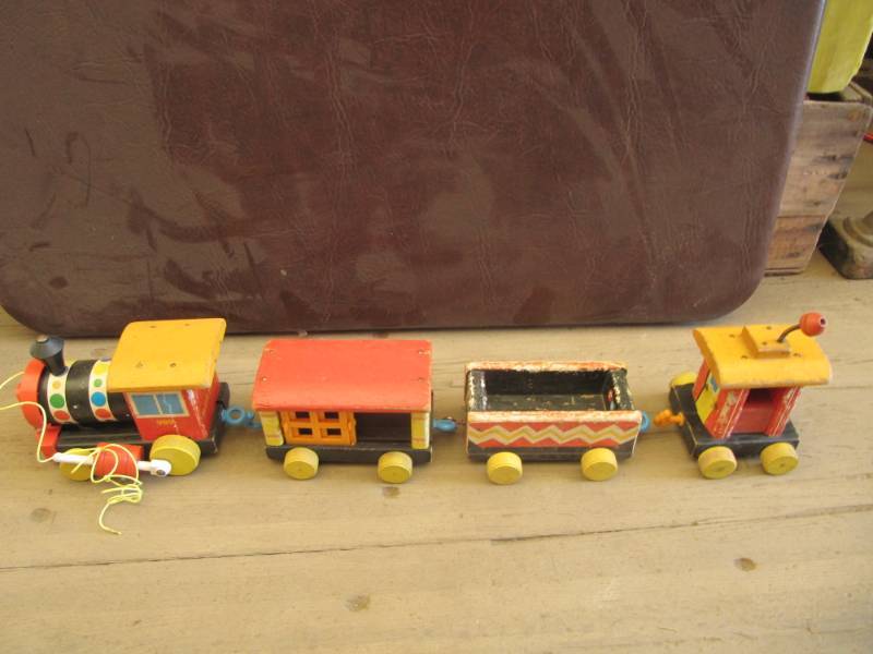 lot 299 image: Vintage Fisher Price wood train & Pound & Saw bench