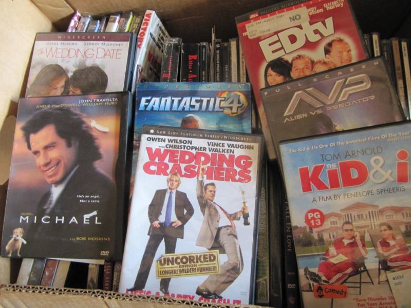 lot 301 image: 50 DVDs and 25 CDs