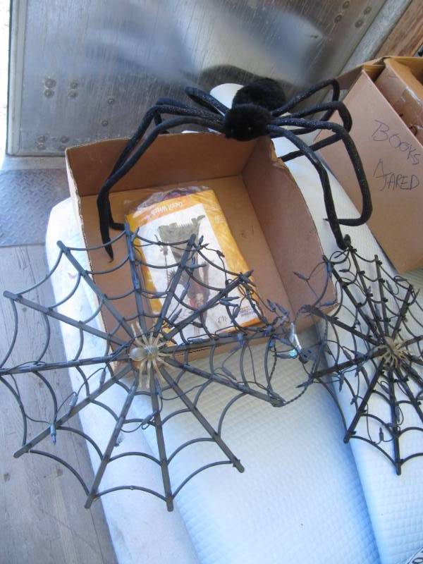 lot 316 image: 2 -  21 light-up spider webs,  big spider,  and devilwitch costume