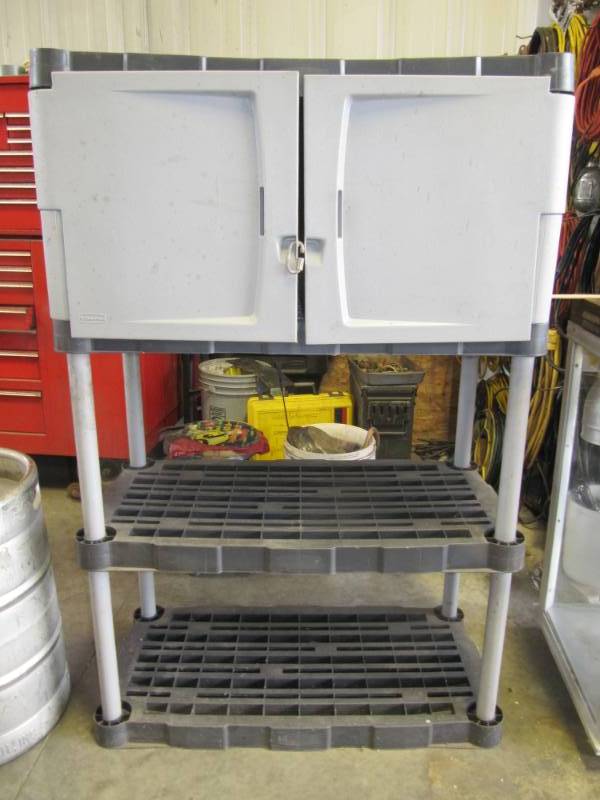 lot 325 image: Rubbermaid Shelf  3 shelves and 2 doors  36W x 50 T