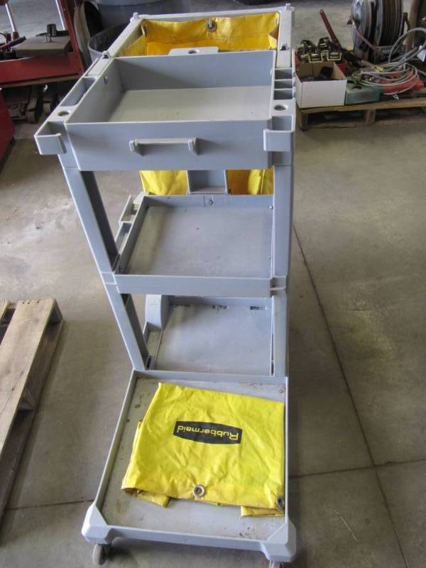 lot 330 image: Rubbermaid Commercial Cleaning Cart comes with 2 vinyl trash bags