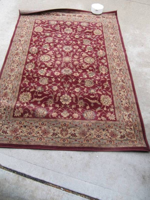 lot 357 image: 5 12  x  7 12 deep red  burgundy rug