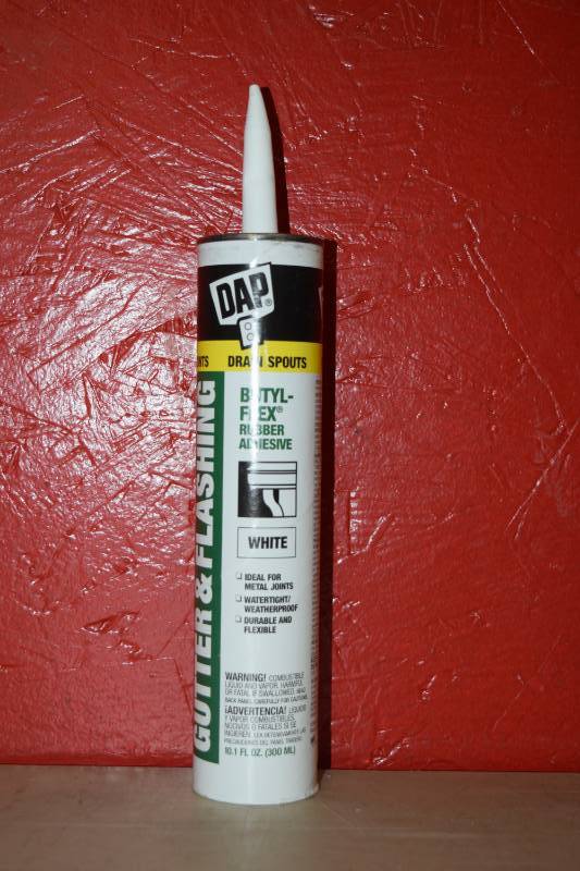 lot 236 image: 11 Tubes DAP Gutter & Flashing Butyl-Flex Rubber Adhesive