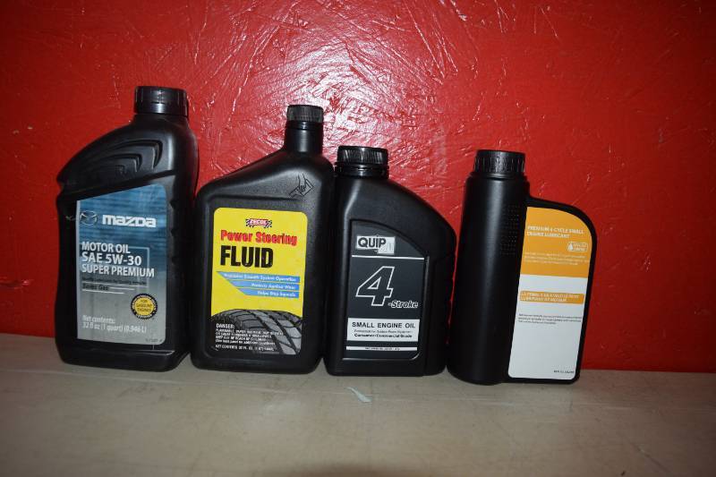 lot 440 image: Oil and Power Steering Fluid