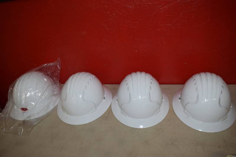lot 552 image: 4 Hard Hats