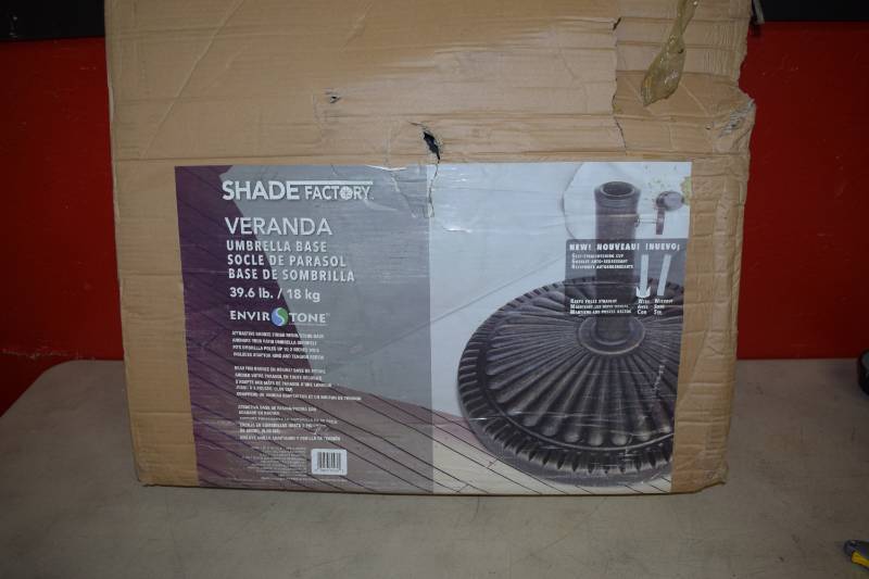lot 553 image: Shade Factory Veranda Umbrella Base