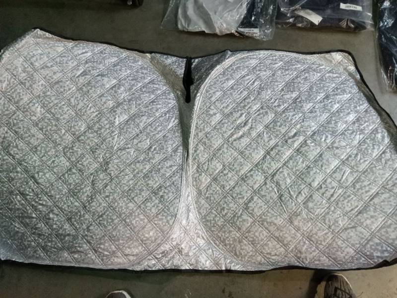 lot 56186 image: Quilted Metallic Silver Car Sun Shade