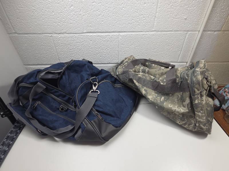 lot 140 image: Navy Blue & Digital Camo Duffle Bags Set