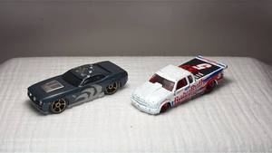 lot 078 image: Hot Wheels Custom Cuda and Baby Ruth NASCAR Diecast Set