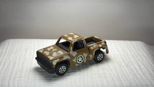 lot 094 image: Chevy Stepside Military Camouflage Toy Truck