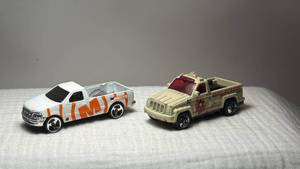 lot 0124 image: Hot Wheels Marcus & Fire Rescue Pickup Trucks