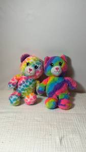 lot 0141 image: Rainbow Build a Bear Plush Bears with Heart Pillows