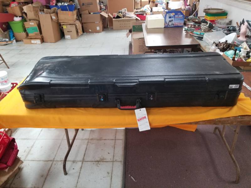 lot 4390 image: Huge Hard Sided Case has Dent