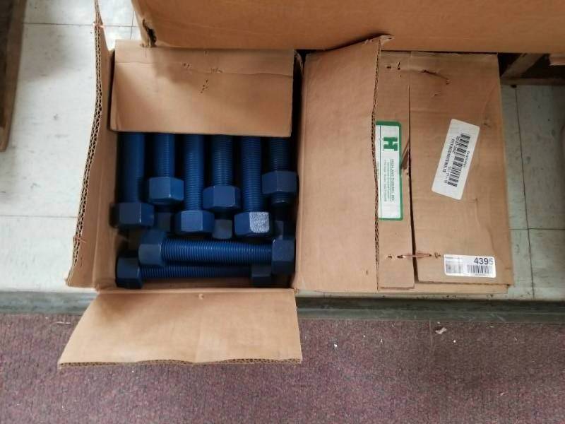 lot 4395 image: (2) Cases Highland Threads Studs Tef Blue Studs and Nuts