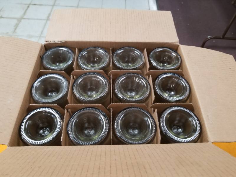 lot 4549 image: Case of Glass Bottles