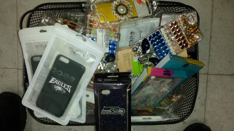 lot 4503 image: Basket of Misc Phone Cases