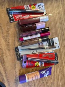 lot 7109 image: 10 piece make up lot Foundation, concealer, brow, eye, and lip