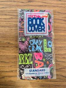 lot 7146 image: Stretchy Book Cover, Standard 8 x 10