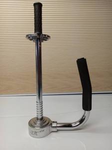 lot 56592 image: Ergonomic Bar-handle stretch film dispenser AR102P. For use with film 12 to 20 wide. Appears to function properly. Handles show little to no wear.   - Retail $75
