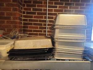 lot 17814 image: Contents of Shelf W Commercial Food Containers, Baking Sheets, and More