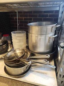 lot 17817 image: Contents of Shelf W Stainless Steel Cookware, Mixing Bowls, Strainers and More