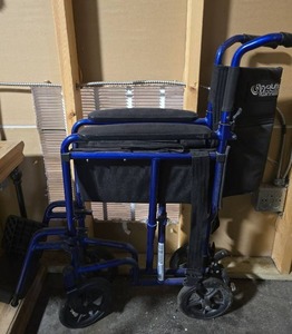 lot 18448 image: Revolution Mobility Transport Wheelchair