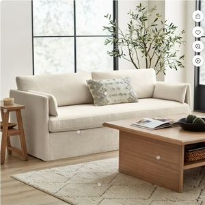 lot 21514 image: Better Homes & Gardens Waylen Slipcover Sofa, Cream, by Dave & Jenny Marrs - Retail $400