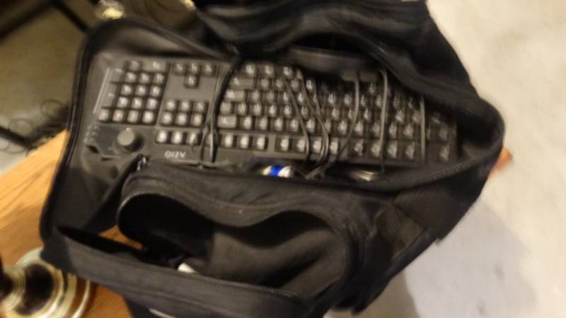 lot 1826 image: Duffle bag with CDS, keyboard, mouse etc.