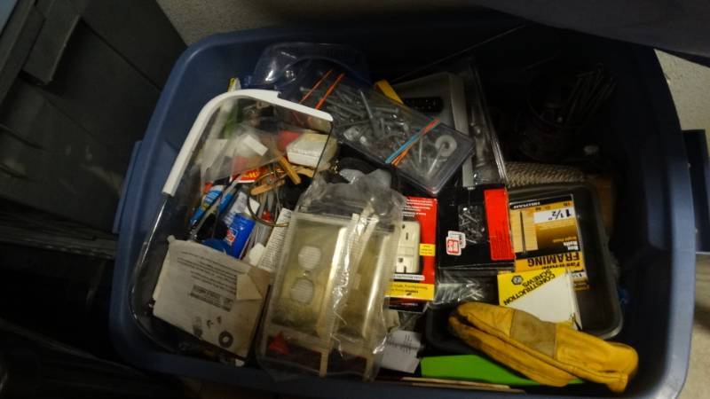 lot 1866 image: Tub full of nuts, screws, outlet covers, outlests, bungee cords and alot more.