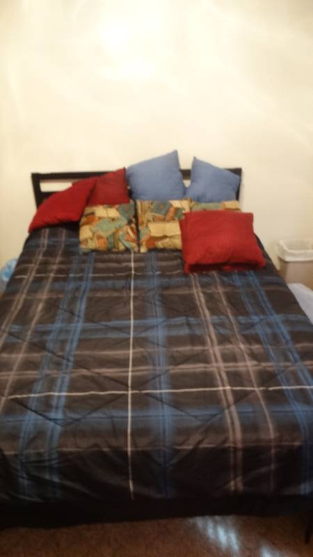 lot 1707 image: Queen size bed includes mattress, bedding, pillows and frame.