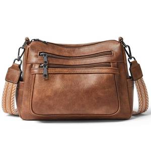 lot 2027 image: Bluome 7L Crossbody Purses for Women, Pocketbooks Medium Crossbody Bags Vegan Leather Shoulder Handbags with Guitar Strap,Brown