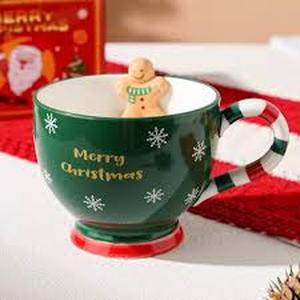 lot 2140 image: Glass hot chocolate mug with gingerbread man decorated on side