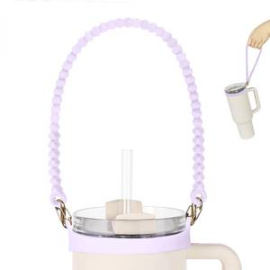 lot 16303 image: VIKIZUES Water Bottle Handle - Soft Silicone Water Bottle Holder, Sling, Lanyard, Carrier with Strap - Fits Most 8-40oz Water Bottles - Compatible Stanley Cup Accessories (Lavender)