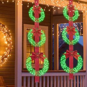 lot 7176 image: Hmlinktt 3-Piece Outdoor Lighted Christmas Wreath, 61L Christmas Wreaths with 3 Red Bow & 300 LED Lights, Christmas Wreaths for Front Door with Hook, Wreath Decorations for Home Yard, Green, Set of 2 (Broken)