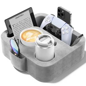 lot 44571 image: Couch Cup Holder Pillow, Sofa and Bed Caddy for iPad, Kindle, Switch, Game Controller, Remotes, Phones, Small-Sized Cup & Drink Holder for Couch, Bed, Desk, Car, Beach, Bathroom Cup Holder - Retail $20