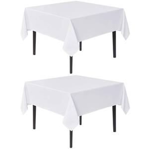 lot 24602 image: White Square Tablecloths 54x54 Inch, 2 Pack - Fabric Table Cloth for Square or Round Tables, Washable Polyester Table Cover for Dinner, Holiday Party, Decorative Display Tables - Retail $16