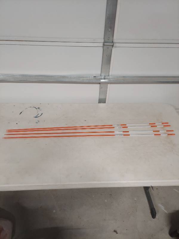 lot 1469 image: 48-inch Orange Driveway Marker Stakes - Set of 4