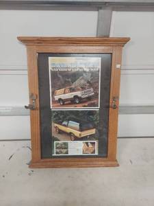 lot 3503 image: 1981 Dodge Ramcharger Advertisement in Oak Frame with Wrench Hooks