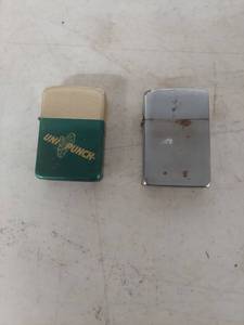 lot 3586 image: (2) Lighters - Uni-Punch