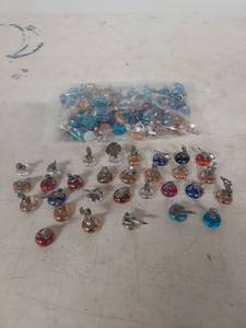lot 1014 image: Pewter Figurines on Colored Glass Bases Collection
