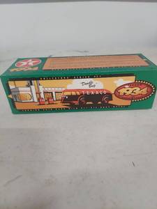 lot 3833 image: 1934 Texaco Diamond T Doodle Bug Coin Bank