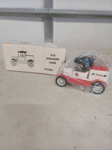lot 3872 image: 1918 Coastal Runabout Bank Die-Cast Model