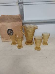 lot 3897 image: Tiara Amber Glass Pitcher and Glasses Set