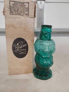 lot 3902 image: Tiara Exclusive Green Glass Character Decanter