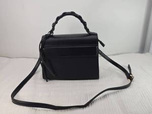lot 39 image: Melie Bianco Black Crossbody Bag with Chain Handle