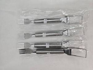 lot 85 image: Stainless steel fork and melon cutter Set of 4