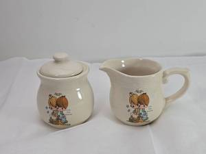 lot 108 image: Precious Moments Love One Another Cream Pitcher Set