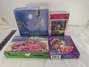 lot 175 image: Puzzle Collection Bundle - Thomas Kinkade and CrazArt