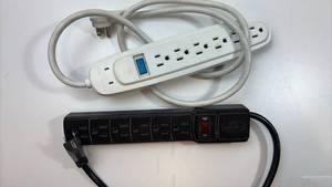 lot 253 image: Power Strip Set - White and Black Surge Protectors