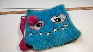 lot 270 image: Blue Monster Furry Plush Backpack